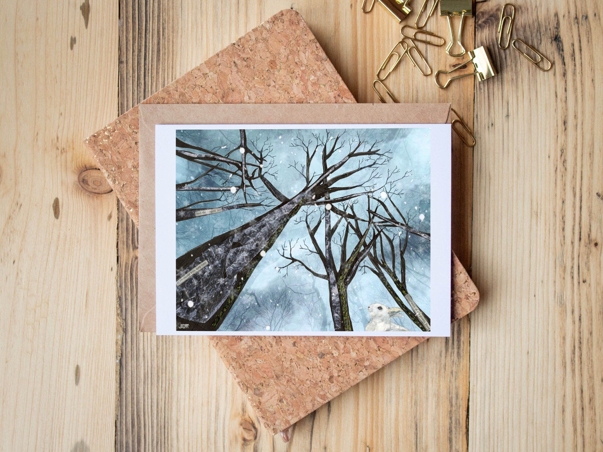 Greeting Card of mixed media collage of snow falling in a winter forest, snowshoe hare - Blank Inside