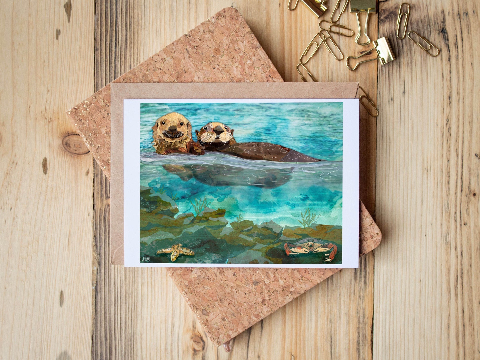 Greeting Card of mixed media collage of two otters in an estuary with starfish and crab below the water - Blank Inside