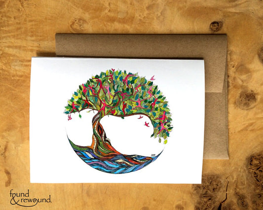 Greeting Card of a Paper Collage of tree of life including many parts of life in tree leaves, river below - inspirational - Blank Inside