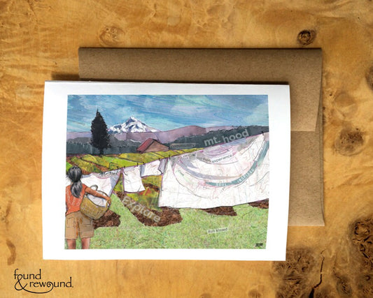Greeting Card of a woman hanging laundry on a clothesline near Mt. Hood - Order a Custom Design for Your Home Town! - Blank Inside