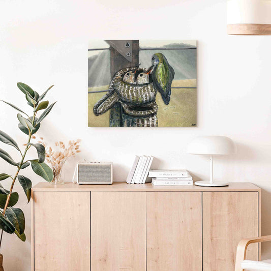 20"x16"x 1.5" Wrapped Canvas Print of a mixed media collage of a Calliope Hummingbird mother feeding her babies in a nest made of mittens